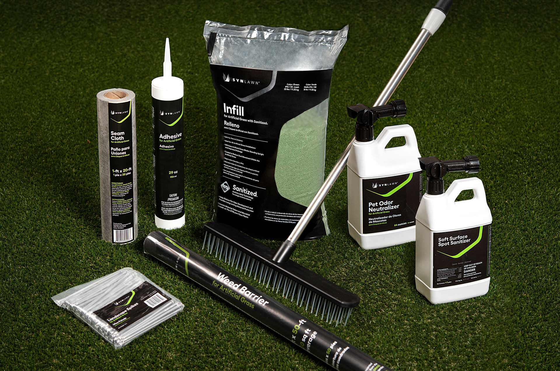 Artificial Grass accessories and tools arranged on top of artificial grass